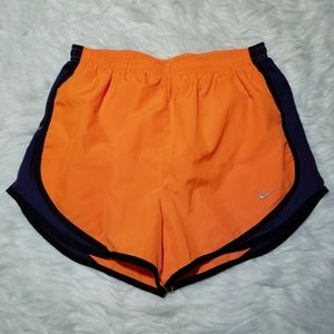 NIKE orange and blue running shorts medium